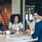Nearshore legal staffing team meeting Nearshore legal staffing professionals training onsite inside a U.S. law firm